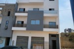 Villa r+3 à la cité apix